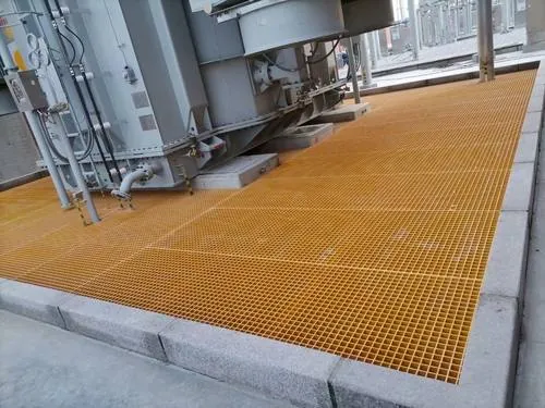 Yellow molded FRP grating installed across the plant floor of a pharmaceutical facility, providing corrosion-resistant access around process equipment